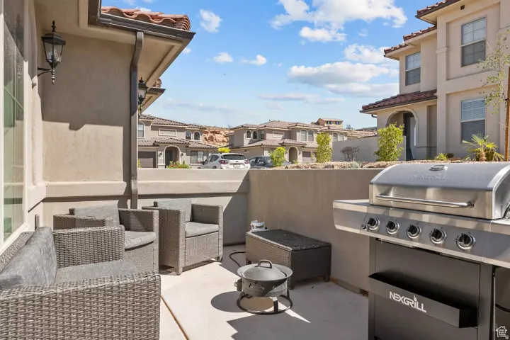View of patio featuring a residential view and area for grilling