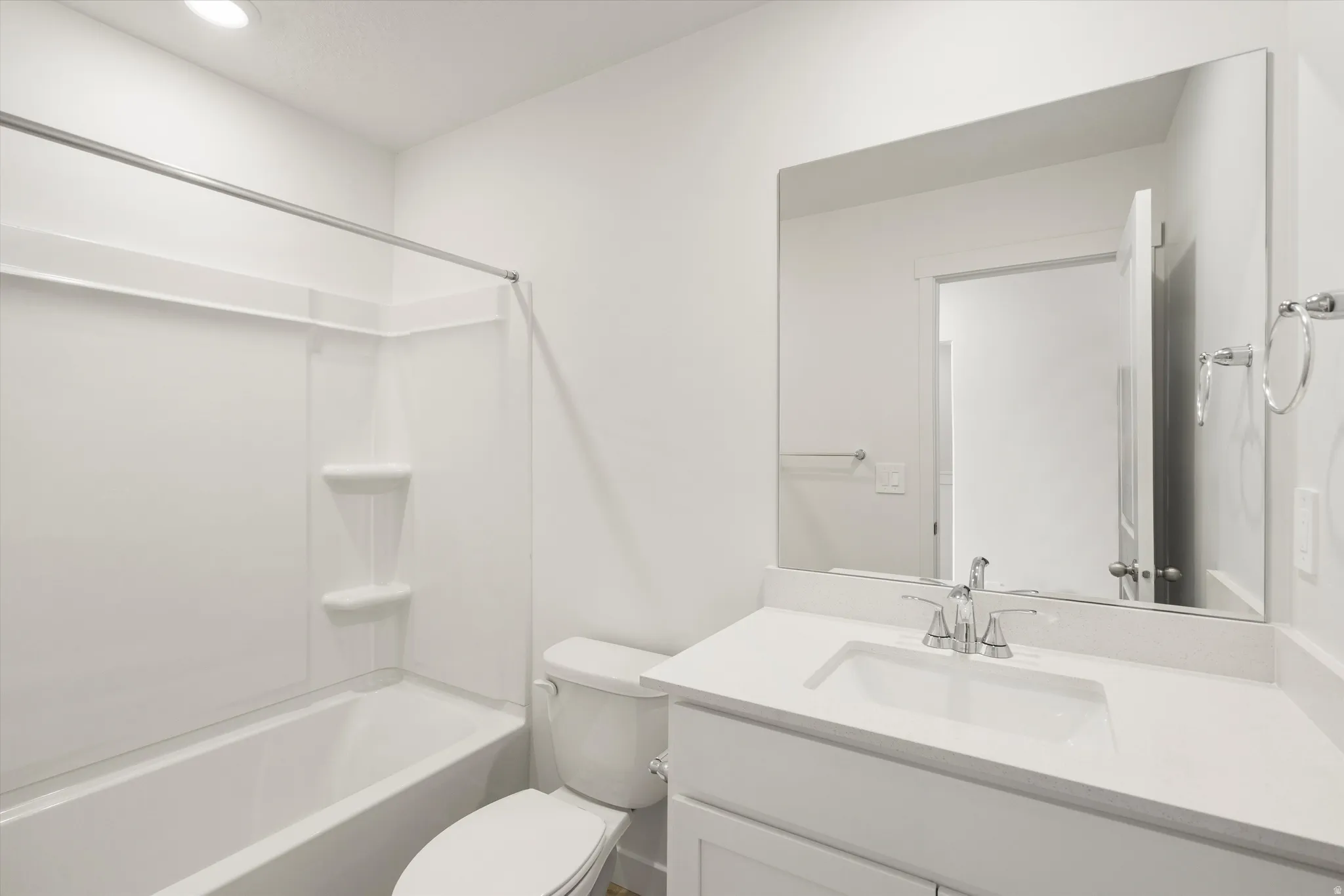 **DISCLAIMER** Interior colors & finishes may vary.Bathroom with vanity and shower / bath combination