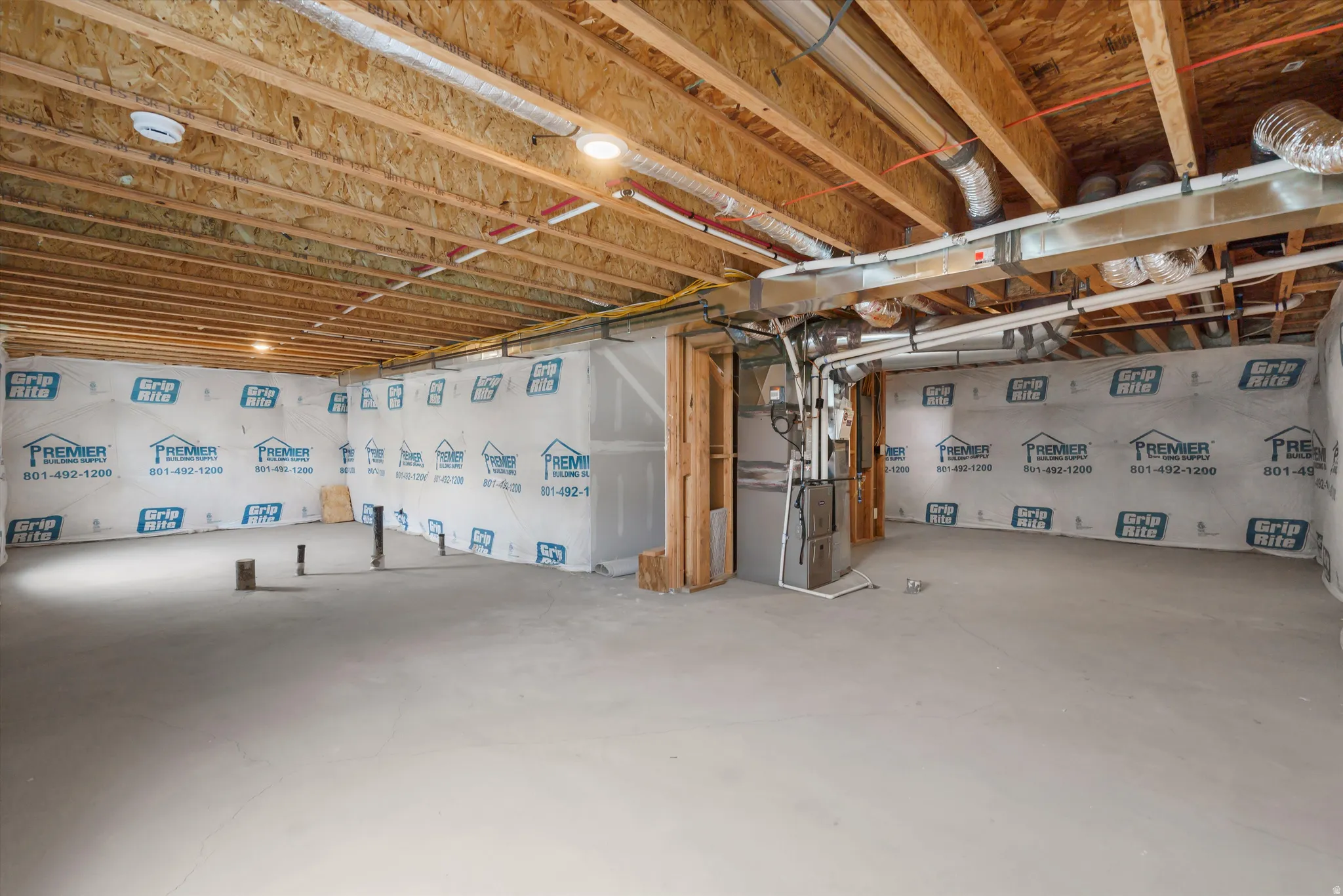 Unfinished basement with heating unit