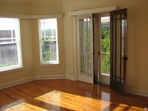 Apt # 11 > Doorway with wood finished floors