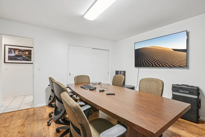 Office area featuring light wood-type flooring