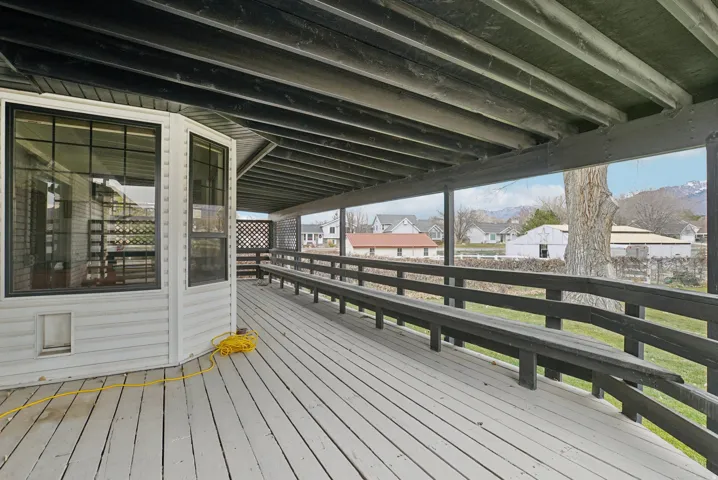 Wooden deck featuring a residential view