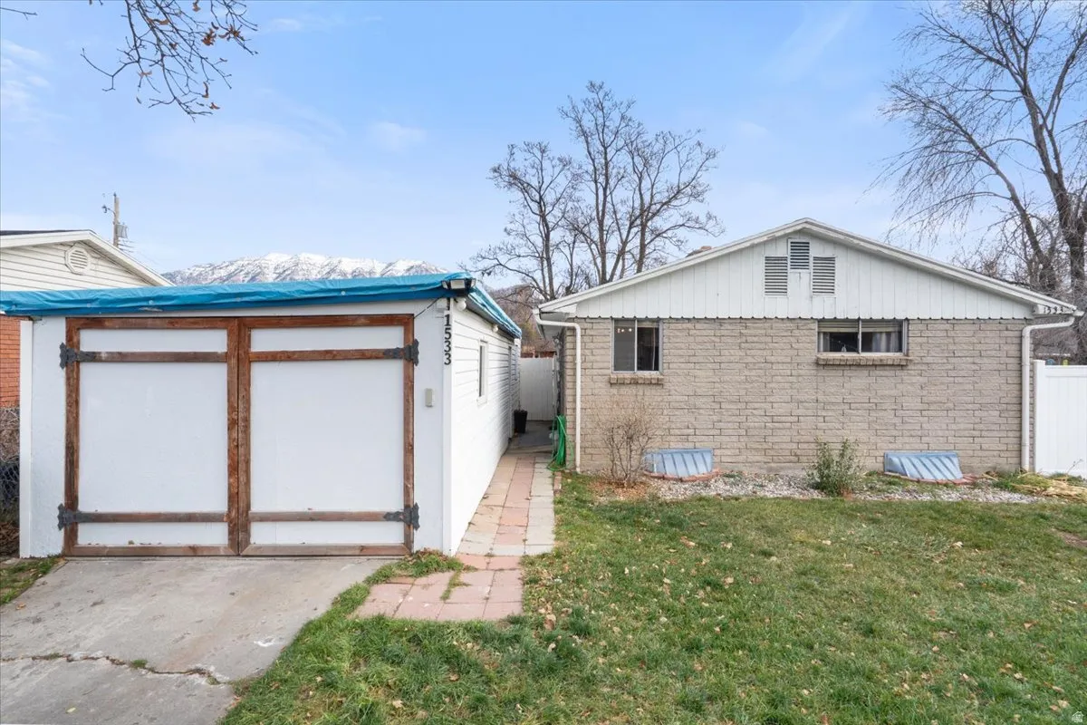 Carport has automatic garage door
