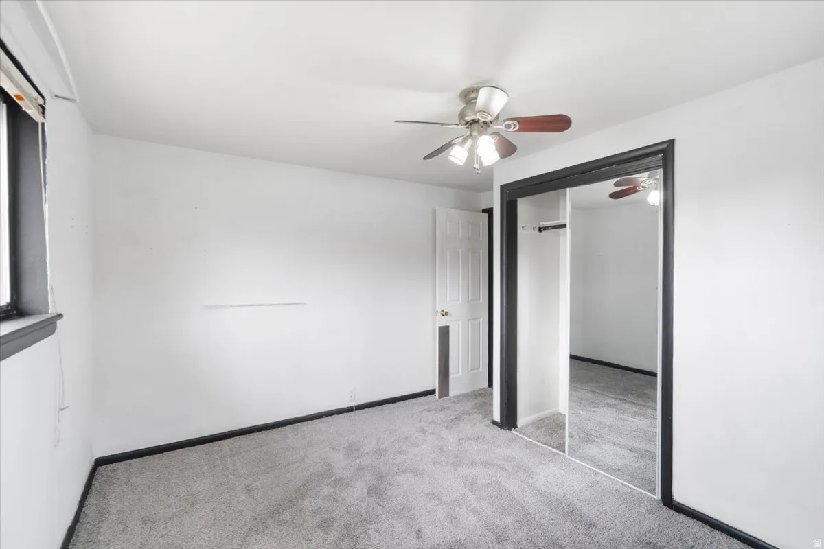 View of the main bedroom closet and door