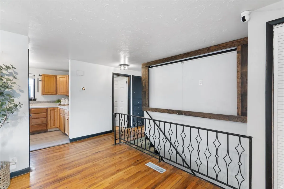 Entry leads to kitchen and main bedrooms