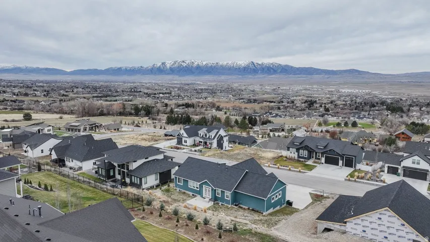 Aerial view of residential area with a mountain backdrop