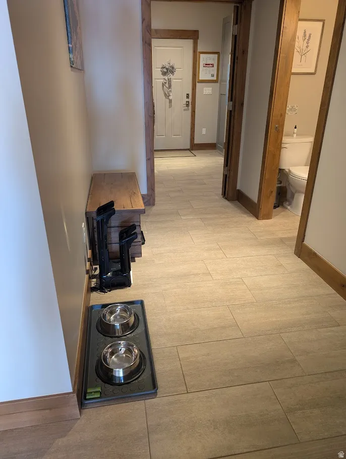 Hall featuring baseboards