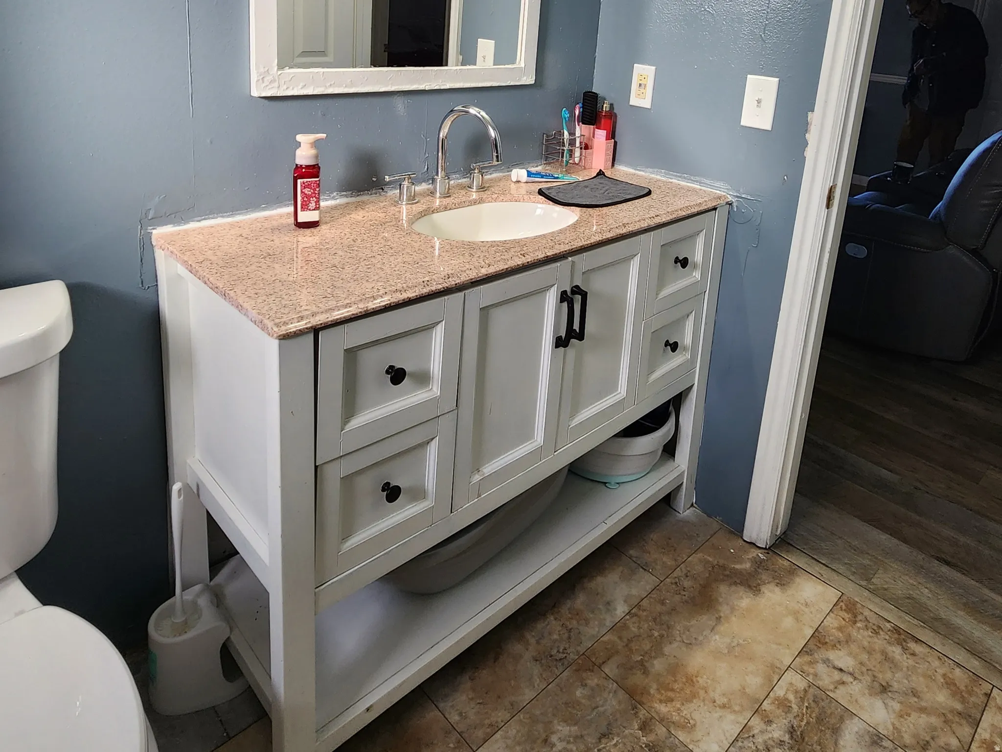 Bathroom with vanity and toilet
