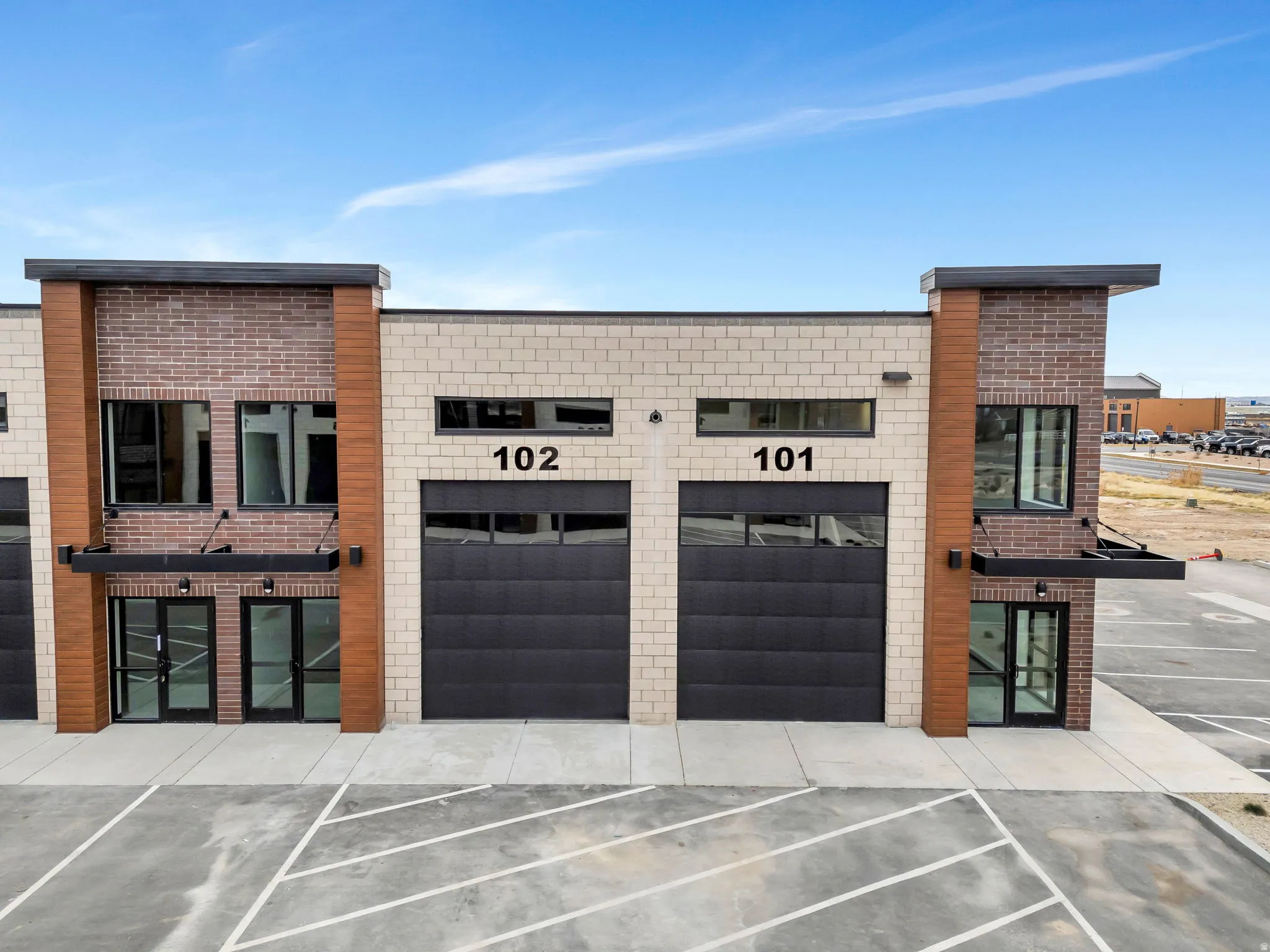 View of building exterior with driveway