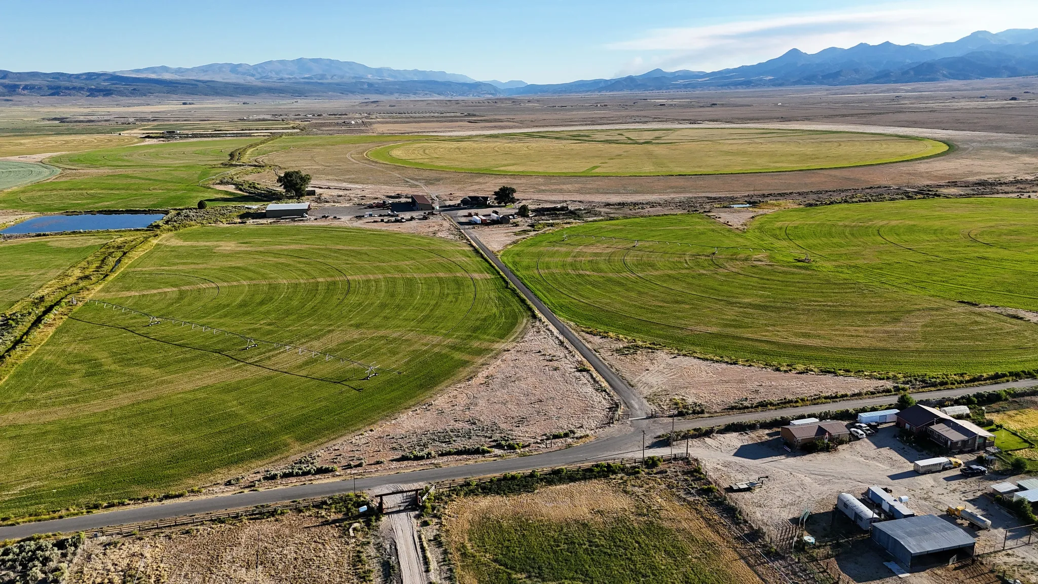 Aerial view of sparsely populated area featuring a mountainous background