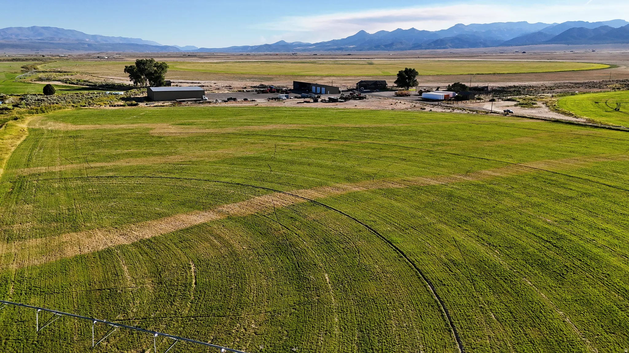 Overview of rural landscape with a mountain backdrop