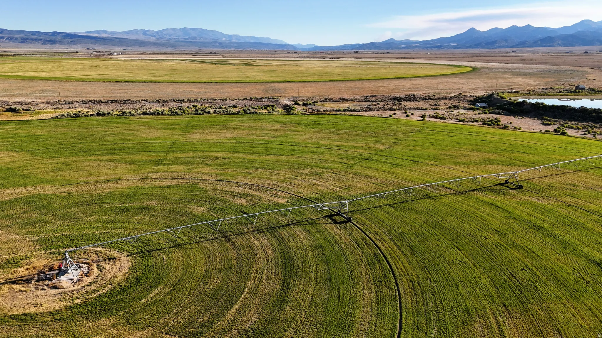 Overview of rural landscape with a mountain backdrop