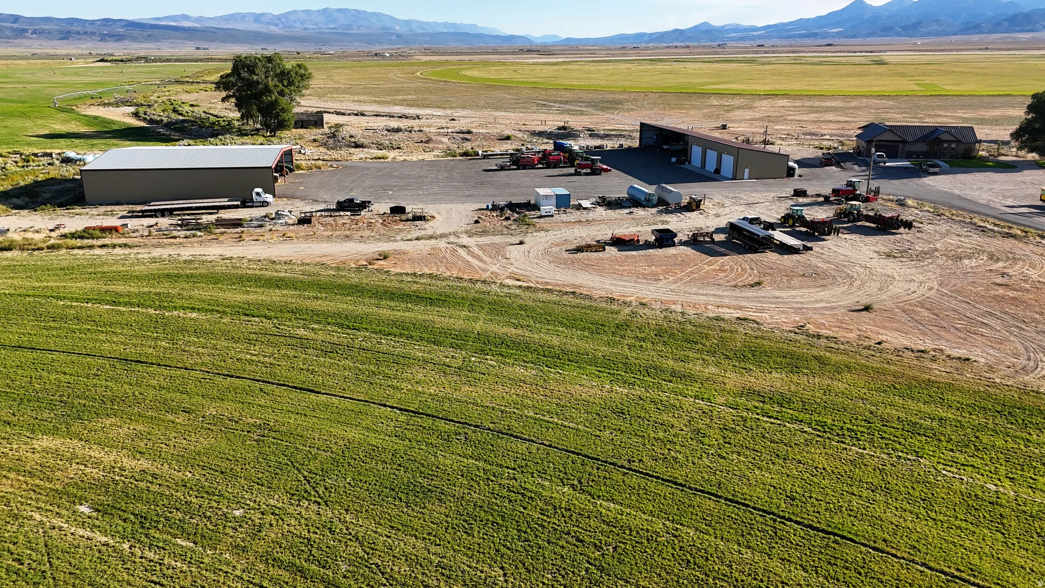 Overview of rural landscape featuring a mountainous background