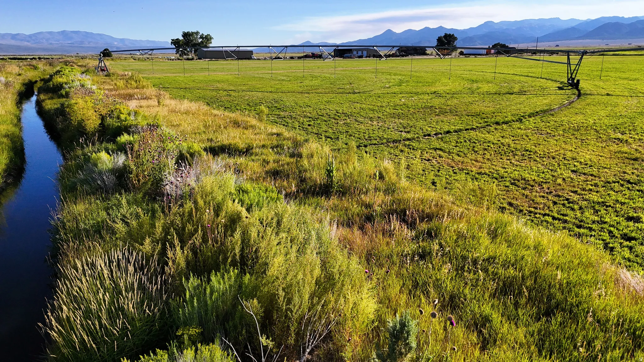 View of mountain backdrop featuring rural landscape and a pastoral area