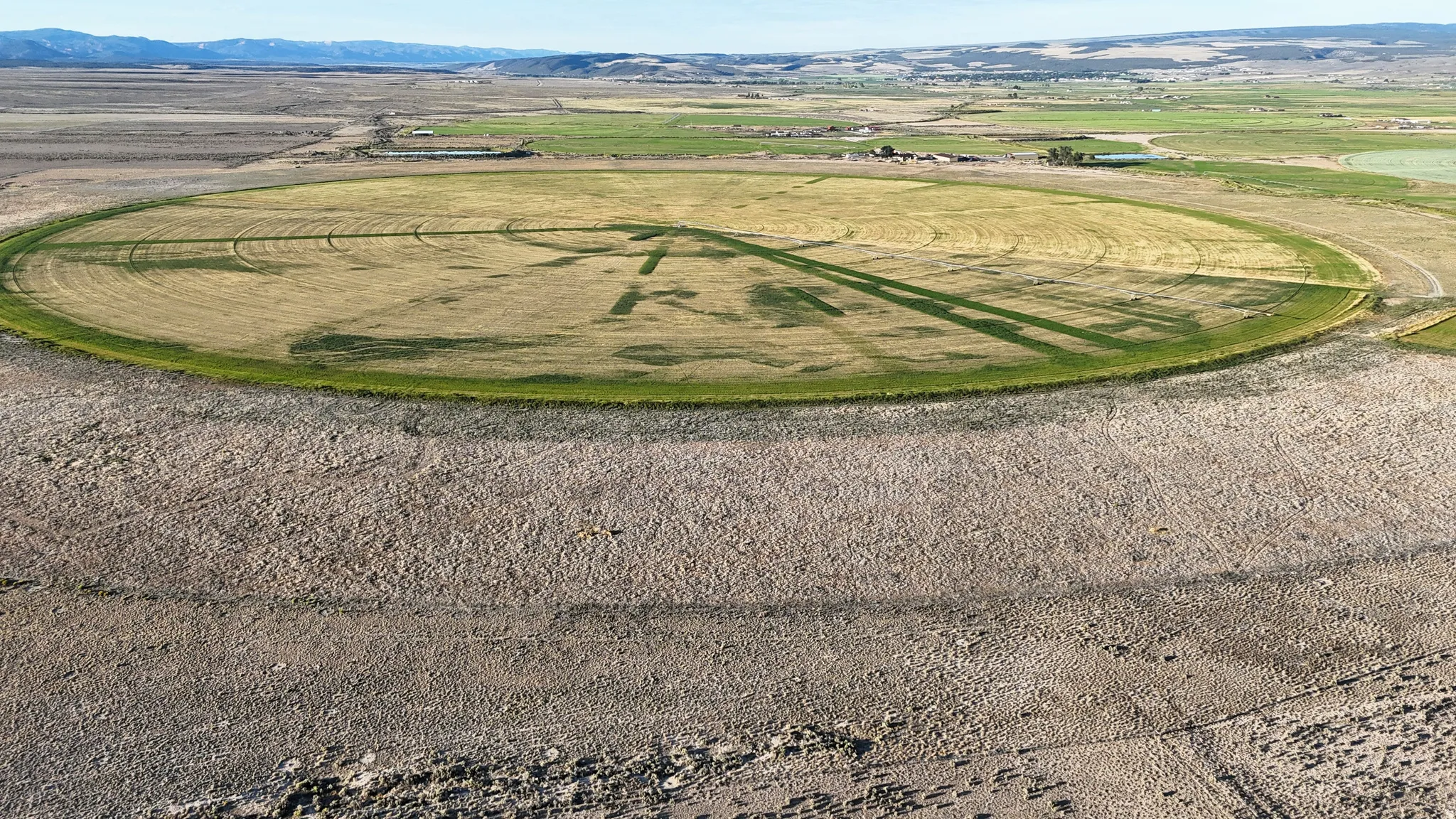 Overview of rural landscape with a mountainous background