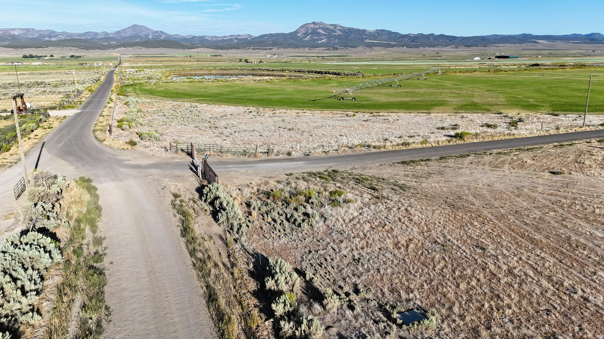 Overview of rural landscape with a mountain backdrop