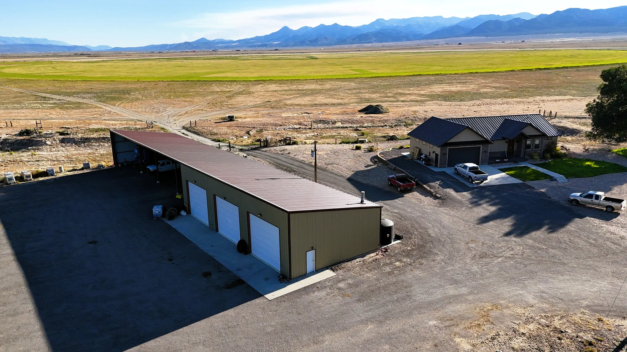 Overview of rural landscape featuring a mountain backdrop