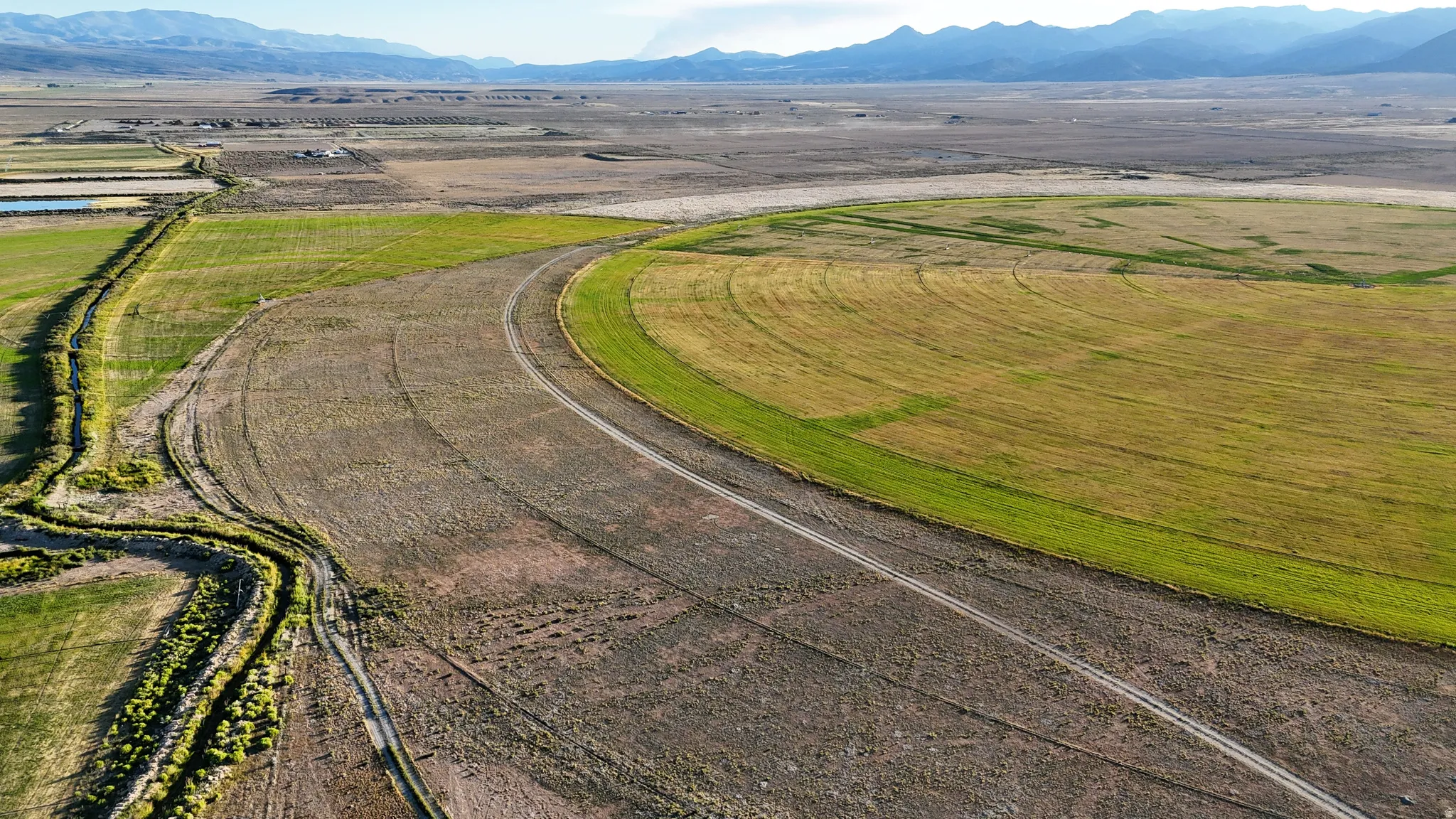 Overview of rural landscape featuring mountains
