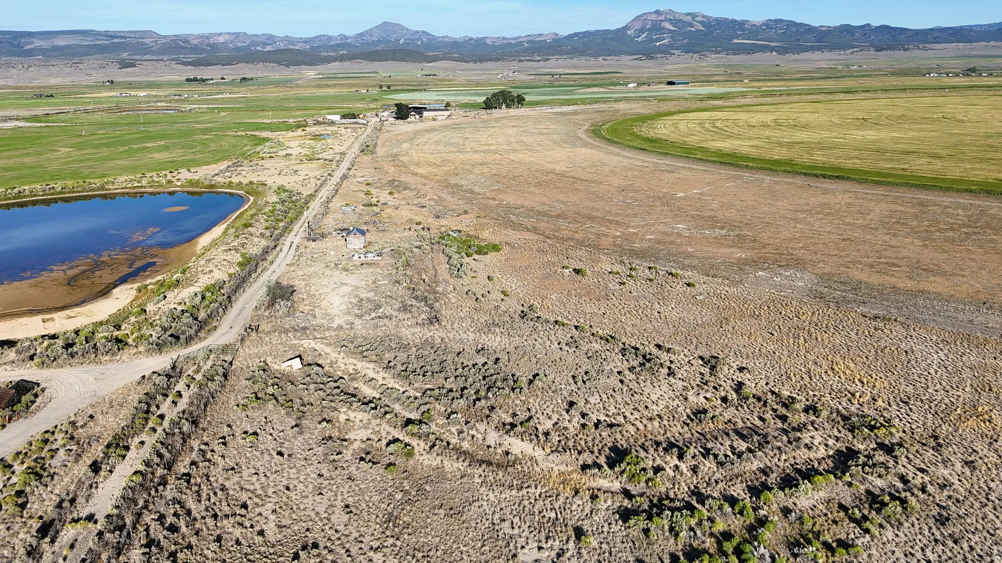 View of property location with a mountain backdrop and rural landscape