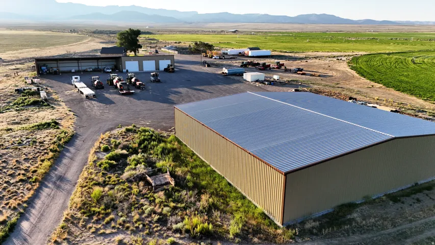 Large-scale metal building featuring a corrugated metal roof and siding