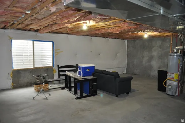 Basement featuring gas water heater