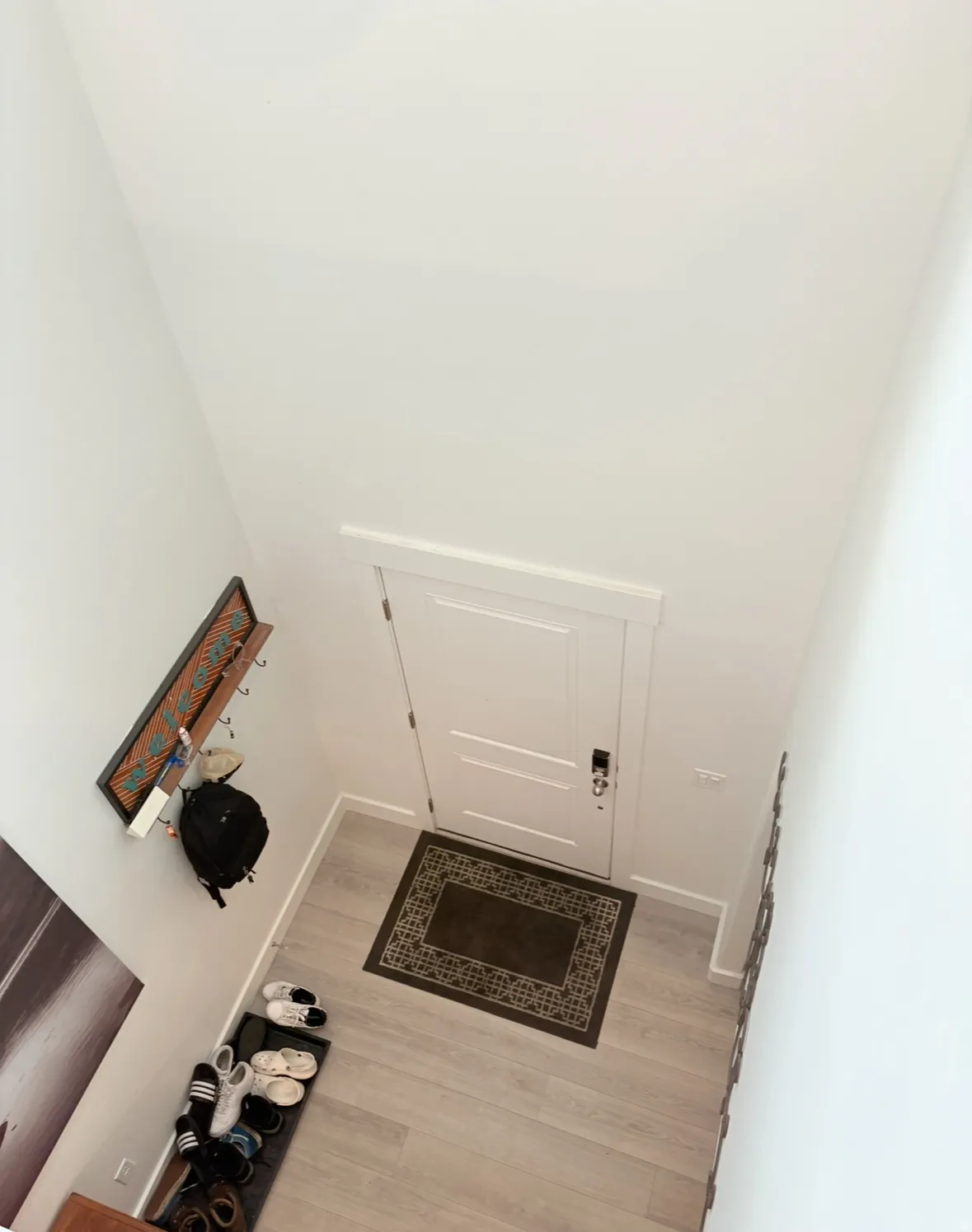 Foyer entrance featuring wood finished floors