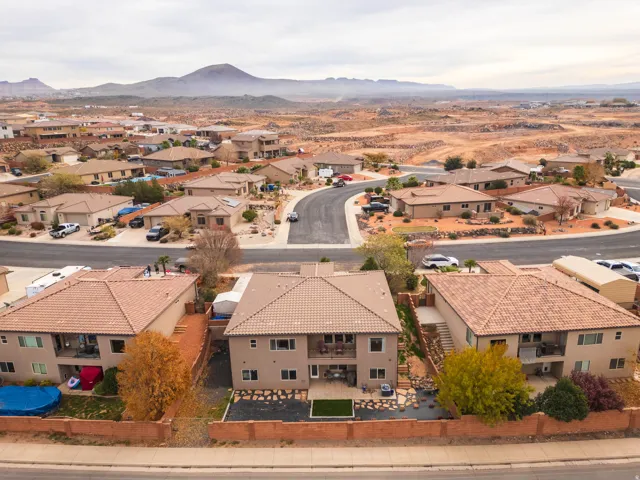 Aerial view of residential area with mountains