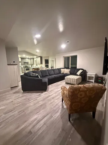 Living room with light wood-style floors