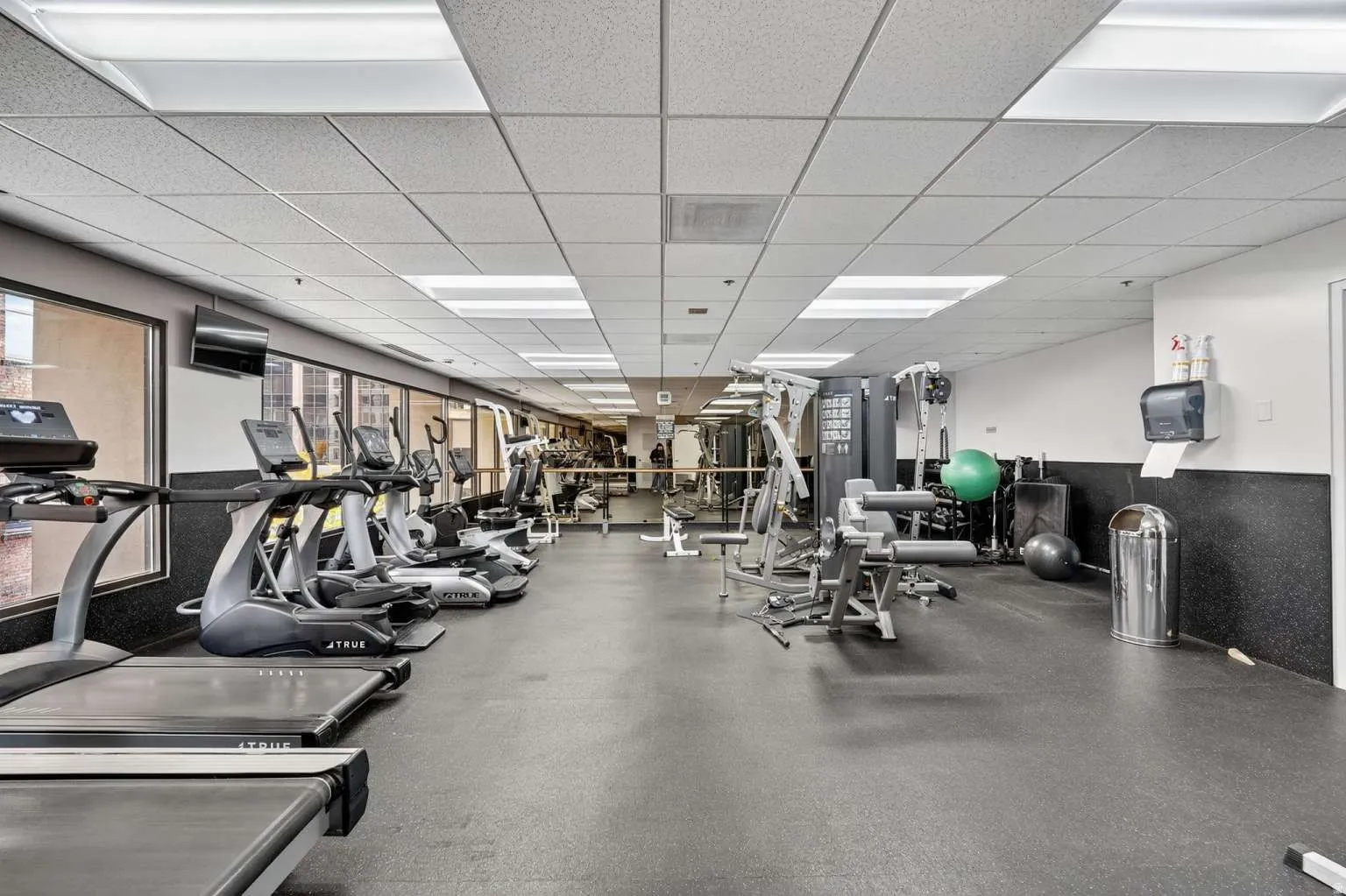 Gym featuring a paneled ceiling