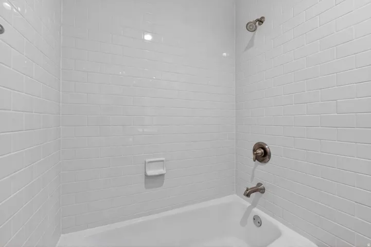 Full bathroom featuring bathtub / shower combination