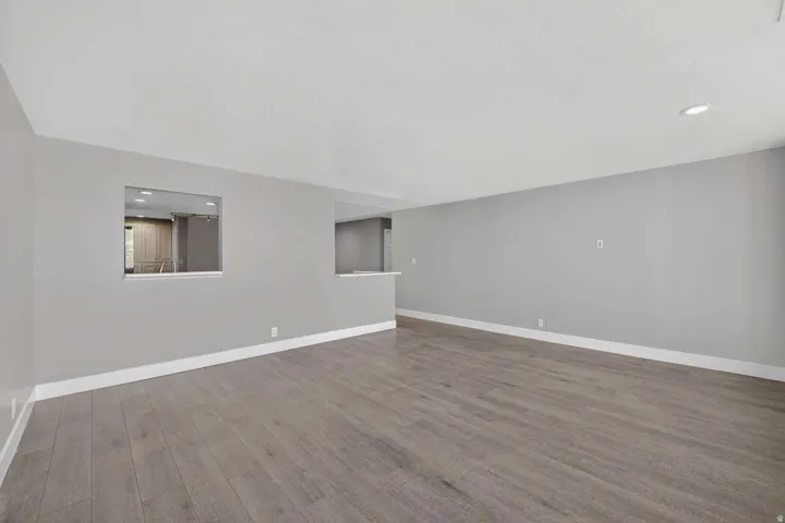 Unfurnished room with recessed lighting and light wood-style floors