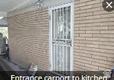 View of side of property with brick siding