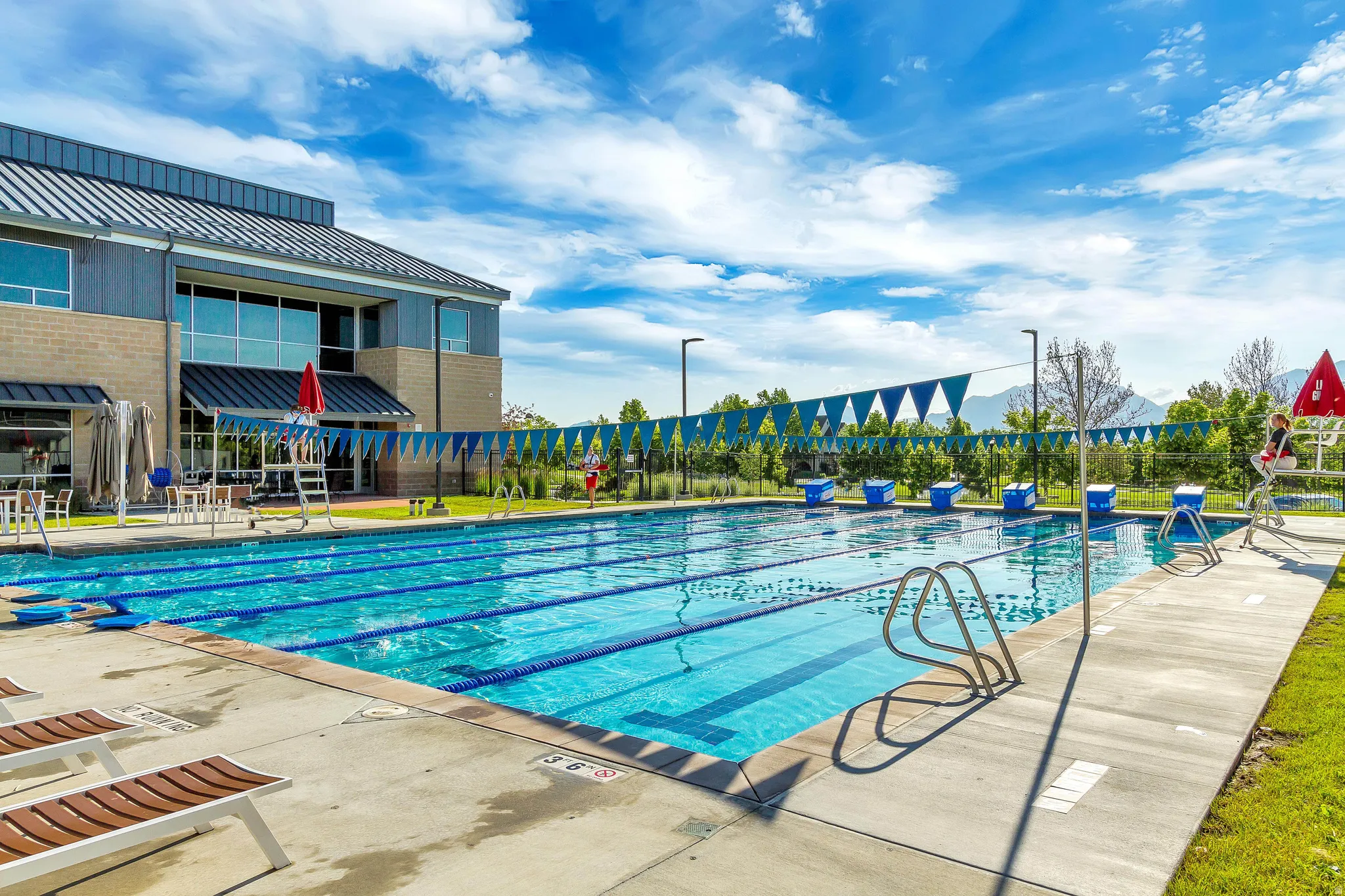 Community pool featuring a patio area