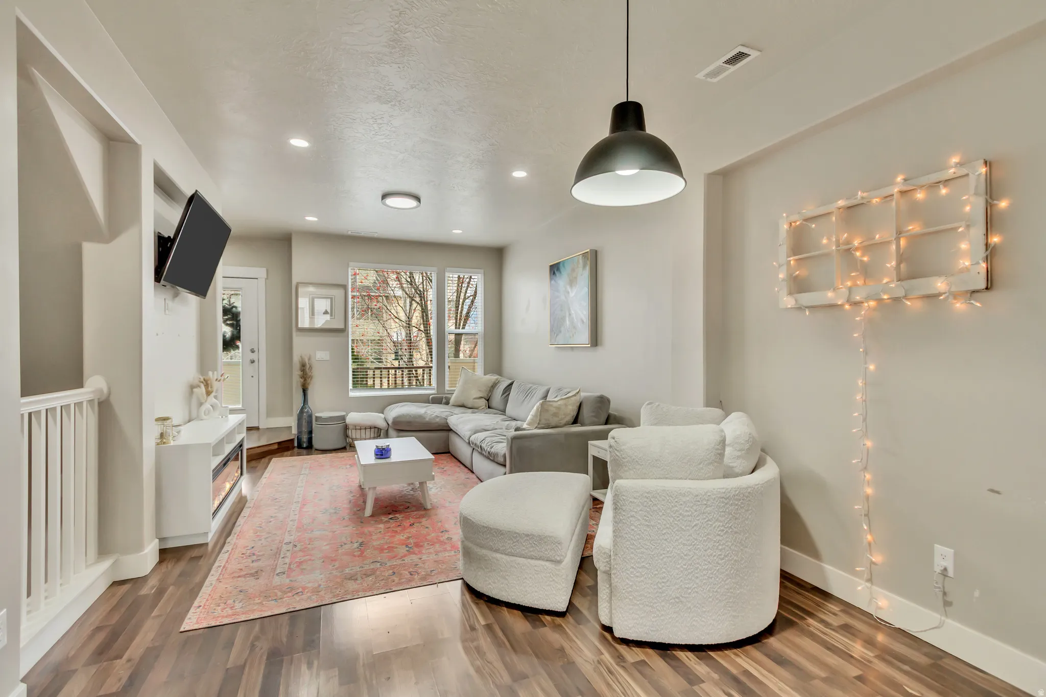 front door entrance and connected family room.