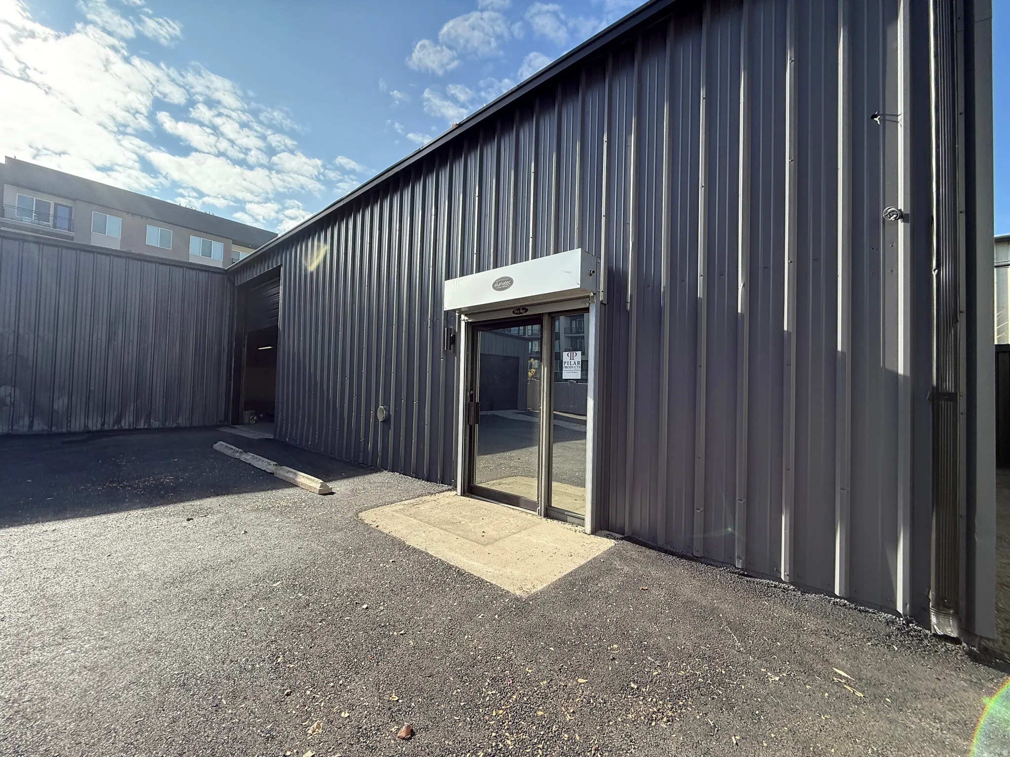 Entrance to property with board and batten siding