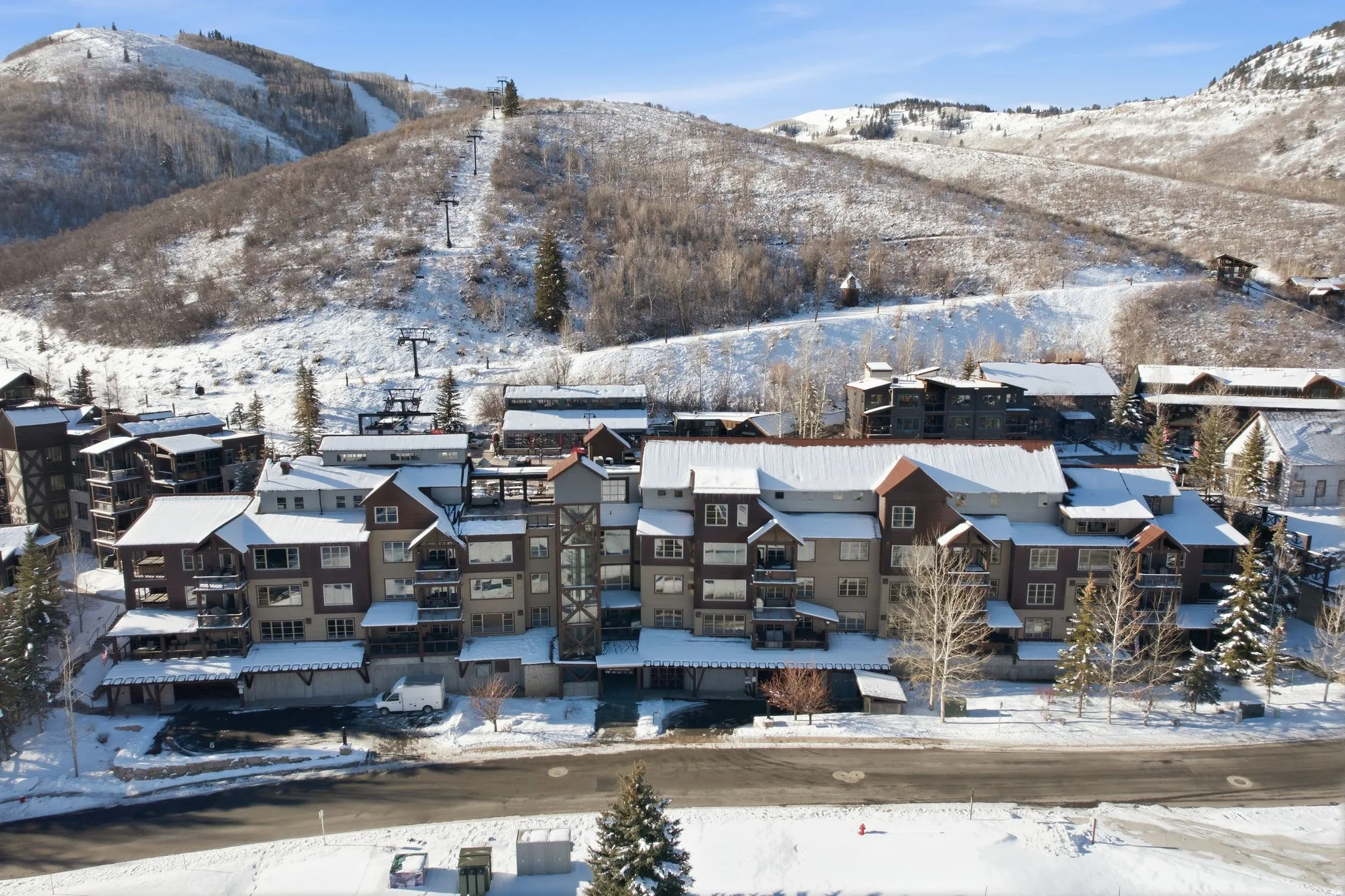 Snowy aerial view with a mountain view