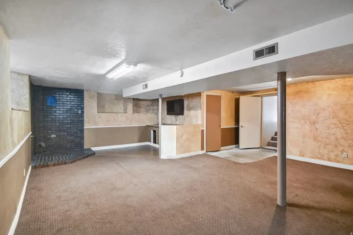 Basement wet bar and place for fireplace