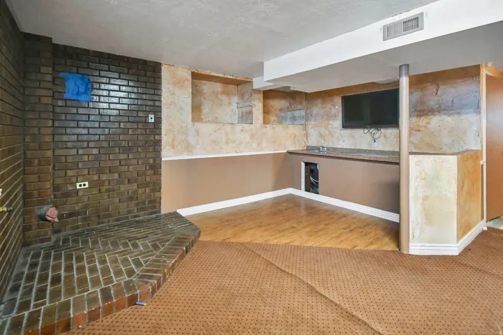 Basement wet bar and place for fireplace