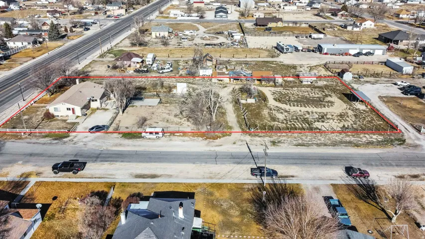 Aerial overview of property's location with property parcel outlined