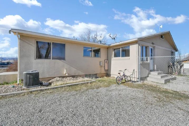 View of front of home featuring stucco siding