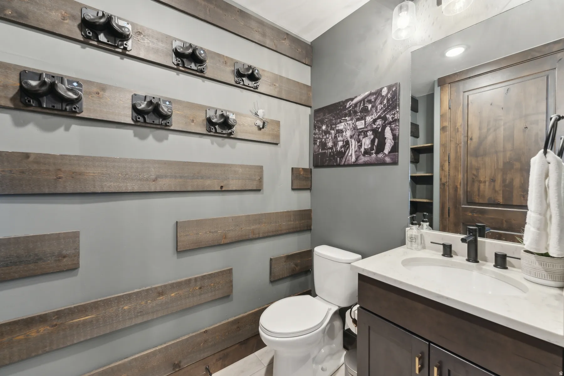 Half bath with vanity and toilet