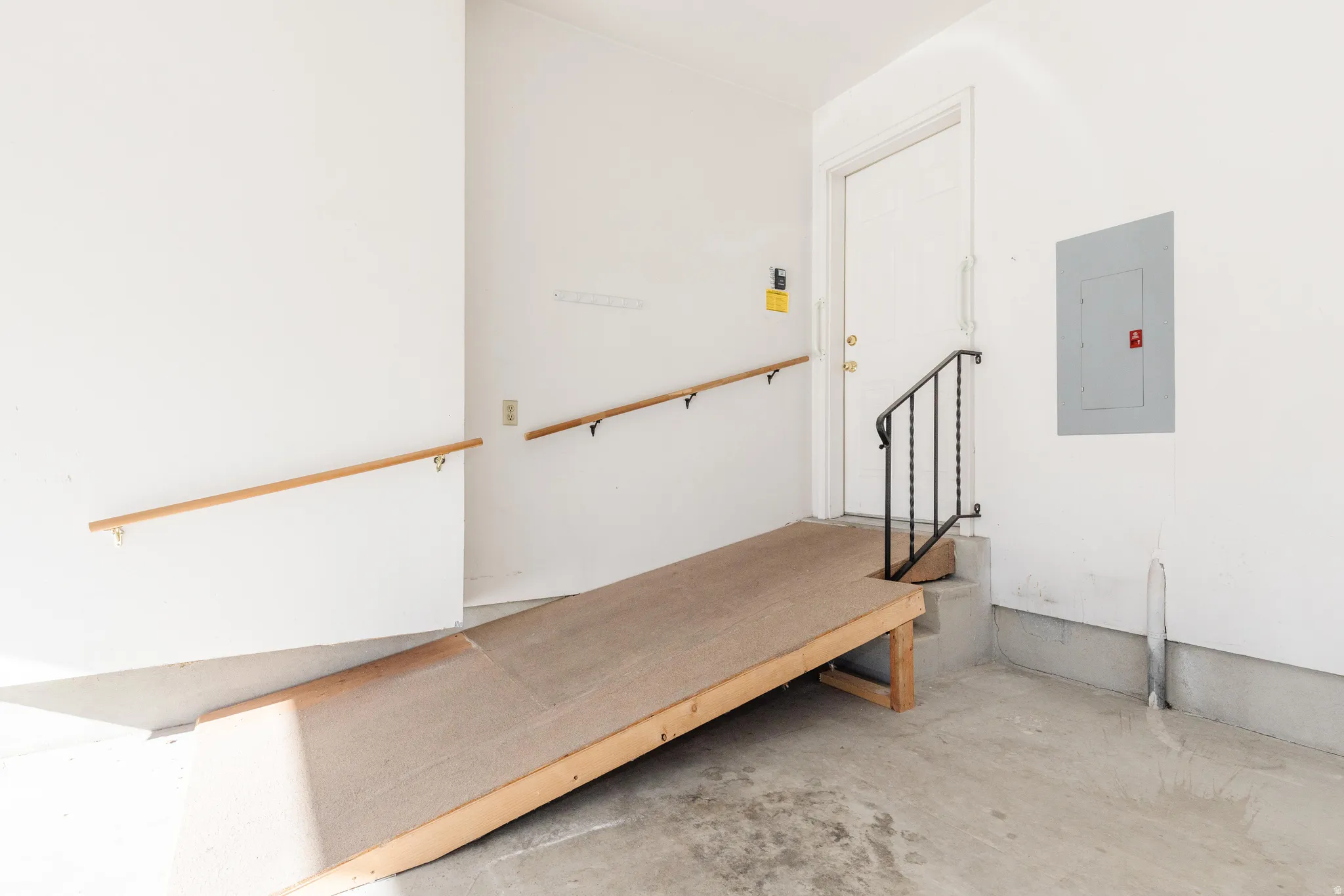 Garage featuring electric panel