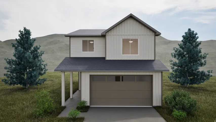 View of front of home with an attached garage and concrete driveway