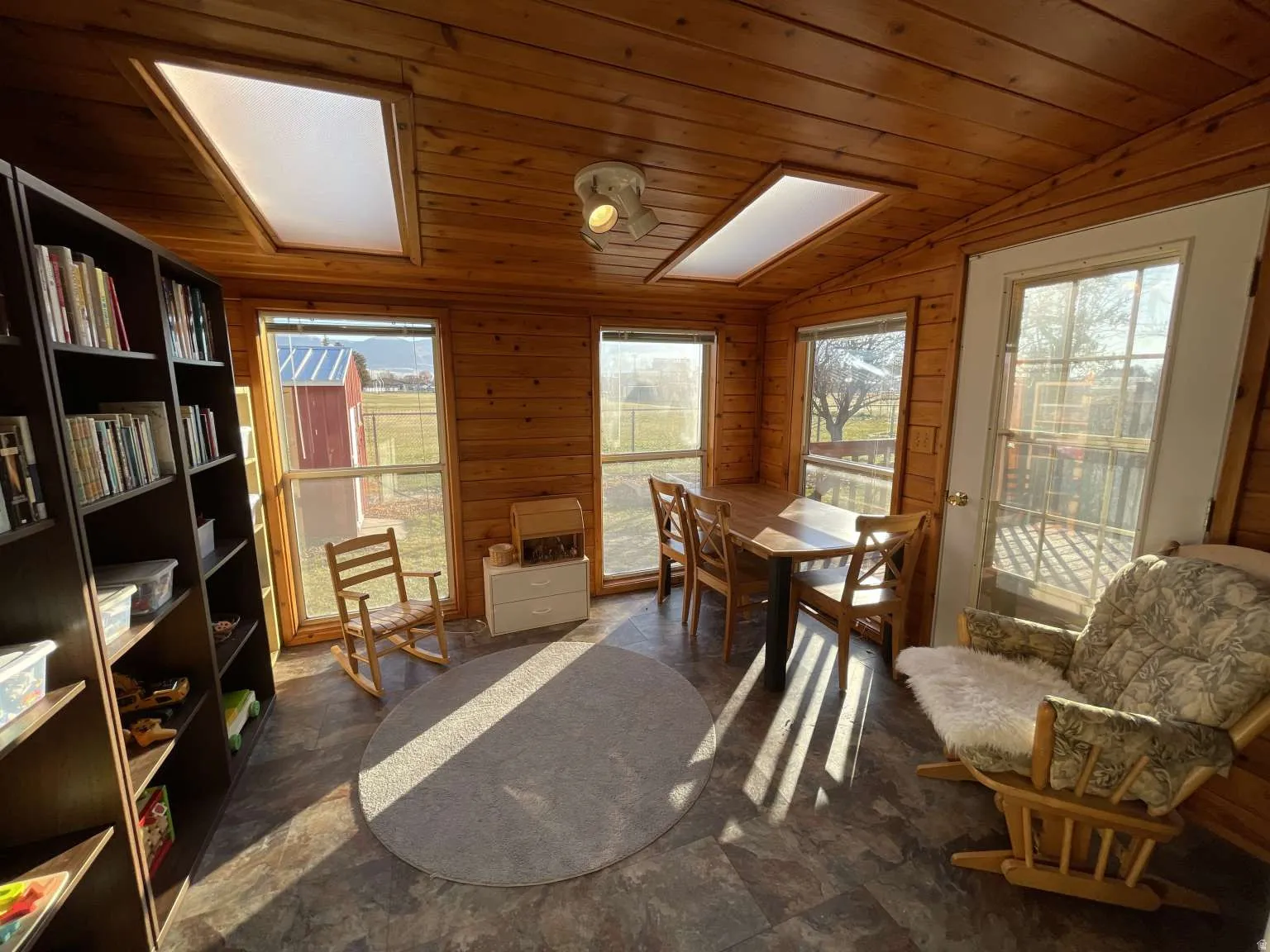 Sunroom with vaulted ceiling