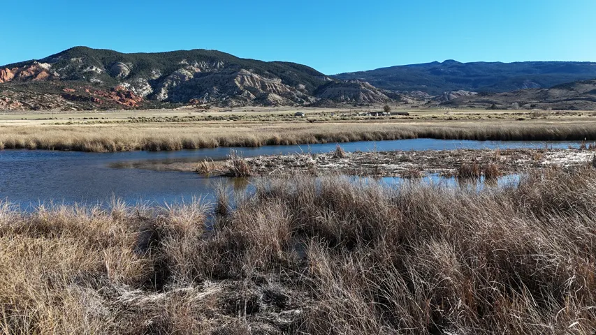 Water view with a mountainous background