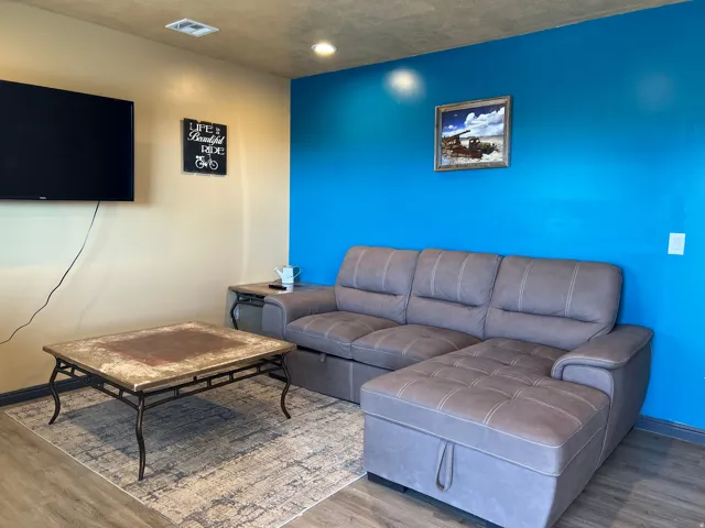 Living area with wood finished floors