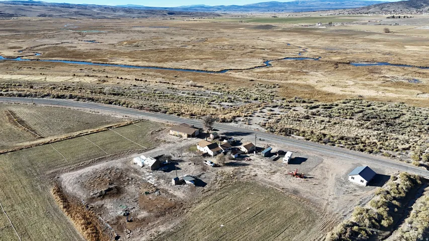 Overview of rural landscape with a mountain backdrop