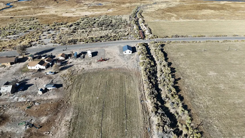 Aerial view of property's location with rural landscape