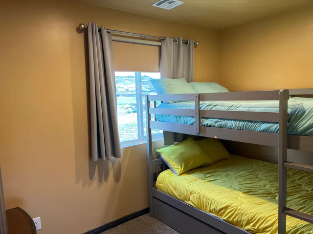 Bedroom featuring baseboards