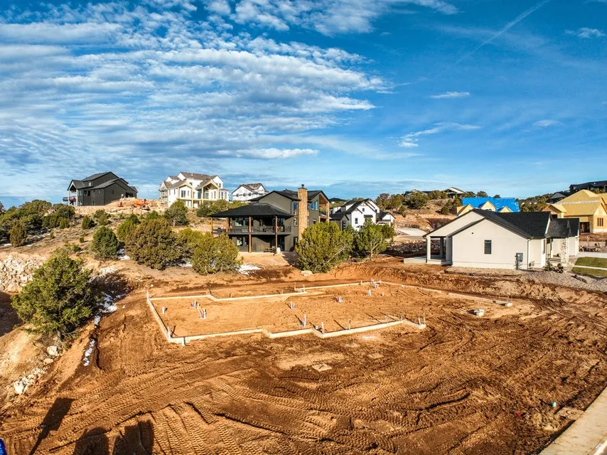 View of yard featuring a residential view and a balcony